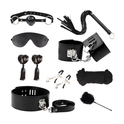 Collection of black leather bondage accessories on a white background